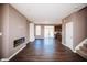 Bright living room with sleek fireplace, hardwood floors, and an open floor plan with lots of natural light at 1902 Zwingley St, Indianapolis, IN 46203