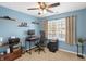 Home office with built-in shelving and window at 1915 Glendora Dr, Indianapolis, IN 46214