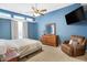 Large main bedroom with a dresser, recliner, and window at 1915 Glendora Dr, Indianapolis, IN 46214