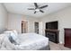 Comfortable bedroom with a queen-size bed and fireplace at 1962 Fairmount Dr, Greenfield, IN 46140