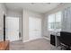 Home office with a large desk, double door closet and window at 1962 Fairmount Dr, Greenfield, IN 46140