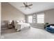 Bright main bedroom suite with vaulted ceilings, plush carpet, and natural light at 2010 Rhettsbury St, Carmel, IN 46032