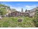 Spacious backyard with a fire pit and outdoor seating, perfect for entertaining or relaxation at 2230 E 75Th St, Indianapolis, IN 46240