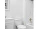 Simple bathroom with shower, toilet, and white vanity at 241 Cleveland St, Columbus, IN 47201