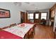 Charming dining room with hardwood floors, wood table, and built-in hutch at 2515 Fairfax Rd, Indianapolis, IN 46227