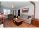 Living room features hardwood floors and a cozy couch at 2515 Fairfax Rd, Indianapolis, IN 46227