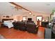 Spacious main bedroom with sitting area and two large leather recliners at 2515 Fairfax Rd, Indianapolis, IN 46227