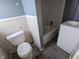 Small bathroom with tub and sink at 3050 N Gladstone Ave, Indianapolis, IN 46218