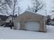 Detached garage with double doors and weathered siding at 3050 N Gladstone Ave, Indianapolis, IN 46218