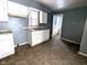 Kitchen with white cabinets and tiled floor at 3050 N Gladstone Ave, Indianapolis, IN 46218
