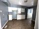 Kitchen with white cabinets and tiled floor at 3050 N Gladstone Ave, Indianapolis, IN 46218