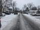 Road construction on a residential street in the winter at 3050 N Gladstone Ave, Indianapolis, IN 46218