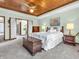 Relaxing bedroom with wood ceiling, carpeted floor, and ensuite access at 310 Vista Ct, Plainfield, IN 46168