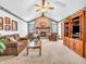 Cozy living room with fireplace and vaulted ceiling at 310 Vista Ct, Plainfield, IN 46168