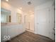 Bathroom features a double sink vanity, large mirror, and walk in shower at 3201 W Keepsake Ln, Monrovia, IN 46157