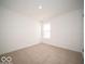 Bedroom with carpet, one window bringing in natural light, and white painted walls at 3201 W Keepsake Ln, Monrovia, IN 46157