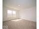 Bedroom with large window and carpeted floors at 3201 W Keepsake Ln, Monrovia, IN 46157