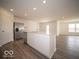 Bright kitchen features stainless appliances, island, and light wood flooring at 3201 W Keepsake Ln, Monrovia, IN 46157