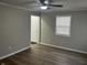 Living room with hardwood floors and neutral walls at 3357 N Drexel Ave, Indianapolis, IN 46218