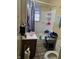 A full bathroom features a shower-tub combination and wood vanity at 3951 N Pasadena St, Indianapolis, IN 46226