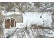 Aerial view of house and snowy backyard at 4702 Michigan Rd, Indianapolis, IN 46228