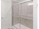 Bathroom with a large shower and gray tile at 4767 E Shadowbrook Dr, Camby, IN 46113