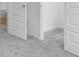 Bedroom doorway features a carpeted floor that leads to an additional bedroom at 4767 E Shadowbrook Dr, Camby, IN 46113