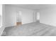 Bedroom featuring carpet, neutral walls, and walk-in closet at 4767 E Shadowbrook Dr, Camby, IN 46113