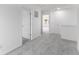 Spacious hallway with carpet, white walls, and multiple entry doors at 4767 E Shadowbrook Dr, Camby, IN 46113
