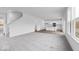 Spacious living room with carpet, open floor plan, and a view into the kitchen at 4767 E Shadowbrook Dr, Camby, IN 46113