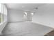 Bright living room with carpet, and lots of natural light at 4767 E Shadowbrook Dr, Camby, IN 46113