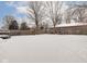 Spacious backyard covered in snow, perfect for winter activities at 5150 Atherton N Dr, Indianapolis, IN 46219