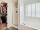 Bathroom featuring a shower, tub, and walk-in closet at 5230 Berkshire South Blvd, Greenwood, IN 46142