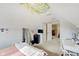 Cozy bedroom with a full bed, desk, and access to another room at 5230 Berkshire South Blvd, Greenwood, IN 46142