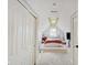 Bright bedroom with a queen bed, window, and ample closet space at 5230 Berkshire South Blvd, Greenwood, IN 46142
