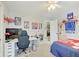 Spacious bedroom with a gaming setup and built in desk at 5230 Berkshire South Blvd, Greenwood, IN 46142