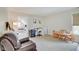 Versatile bonus room with a desk, chairs, and adjoining bedroom at 5230 Berkshire South Blvd, Greenwood, IN 46142