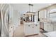 Modern kitchen with white cabinets, stainless steel appliances, and an island at 5230 Berkshire South Blvd, Greenwood, IN 46142