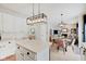 Bright kitchen with white cabinets, an island, and stainless steel appliances at 5230 Berkshire South Blvd, Greenwood, IN 46142