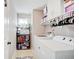 Laundry room with washer, dryer, and storage cabinets at 5230 Berkshire South Blvd, Greenwood, IN 46142