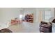 Playroom with a table, chairs, and built-in storage at 5230 Berkshire South Blvd, Greenwood, IN 46142