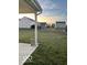 Spacious backyard with grassy area and patio at 6628 Heben Ct, Indianapolis, IN 46113