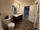 Clean bathroom with a dark wood vanity and a shower/tub combo at 6628 Heben Ct, Indianapolis, IN 46113