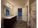 Clean bathroom with a dark wood vanity and a shower/tub combo at 6628 Heben Ct, Indianapolis, IN 46113