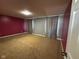 Spacious bedroom with neutral carpeting and freshly painted walls at 6628 Heben Ct, Indianapolis, IN 46113