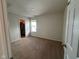 Bright bedroom featuring neutral walls and carpeted floors at 6628 Heben Ct, Indianapolis, IN 46113