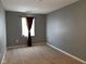 Simple bedroom with gray walls and carpet flooring at 6628 Heben Ct, Indianapolis, IN 46113