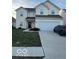 Two-story house with attached garage, front yard, and neutral siding at 6628 Heben Ct, Indianapolis, IN 46113