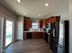 Kitchen with wood cabinets and stainless steel appliances at 6628 Heben Ct, Indianapolis, IN 46113