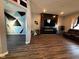 Living room with geometric accent wall at 6628 Heben Ct, Indianapolis, IN 46113